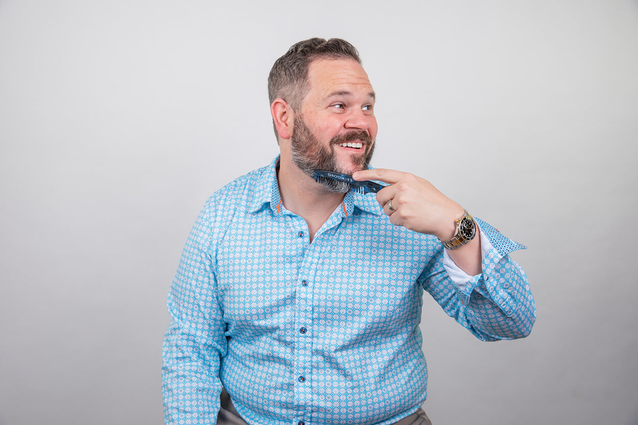 Professional corporate headshot of a man in blue checkered shirt by Pixel Studio Productions in Houston