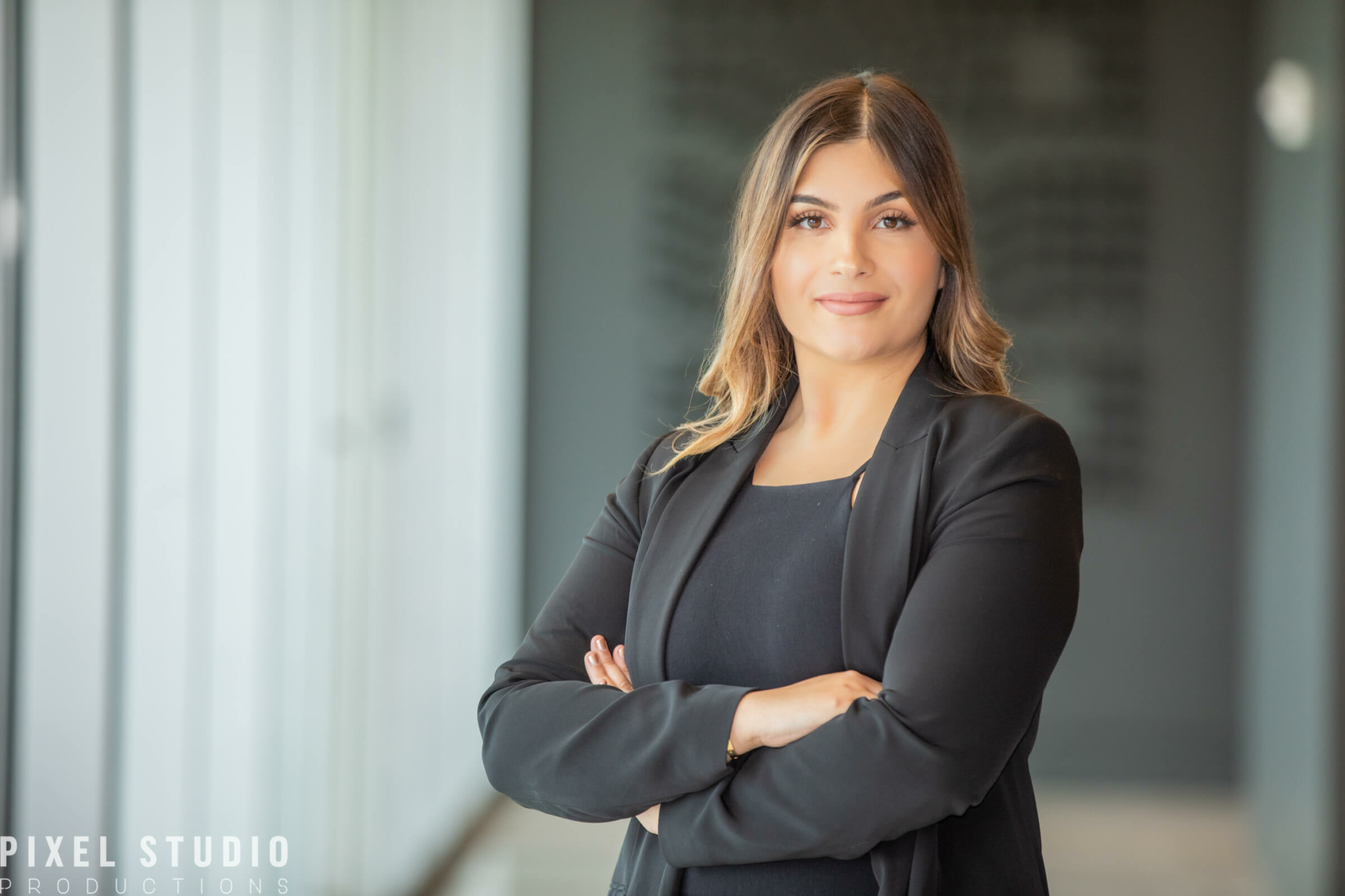 Professional headshot of a confident business professional taken by Pixel Studio Productions in Houston