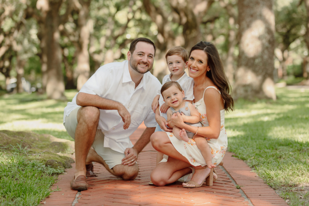 Happy family portrait of Paige and Seth Bucher, clients of Pixel Studio Productions, featured on the Testimonials page