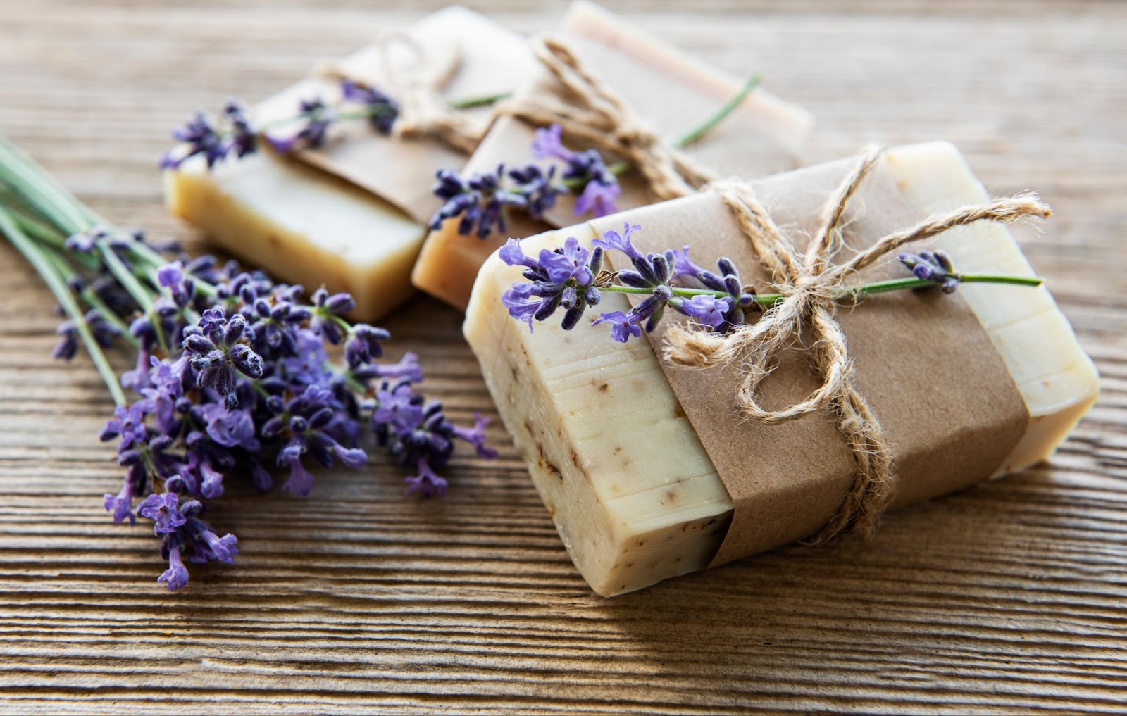 product shot of bars of soap with lavender props