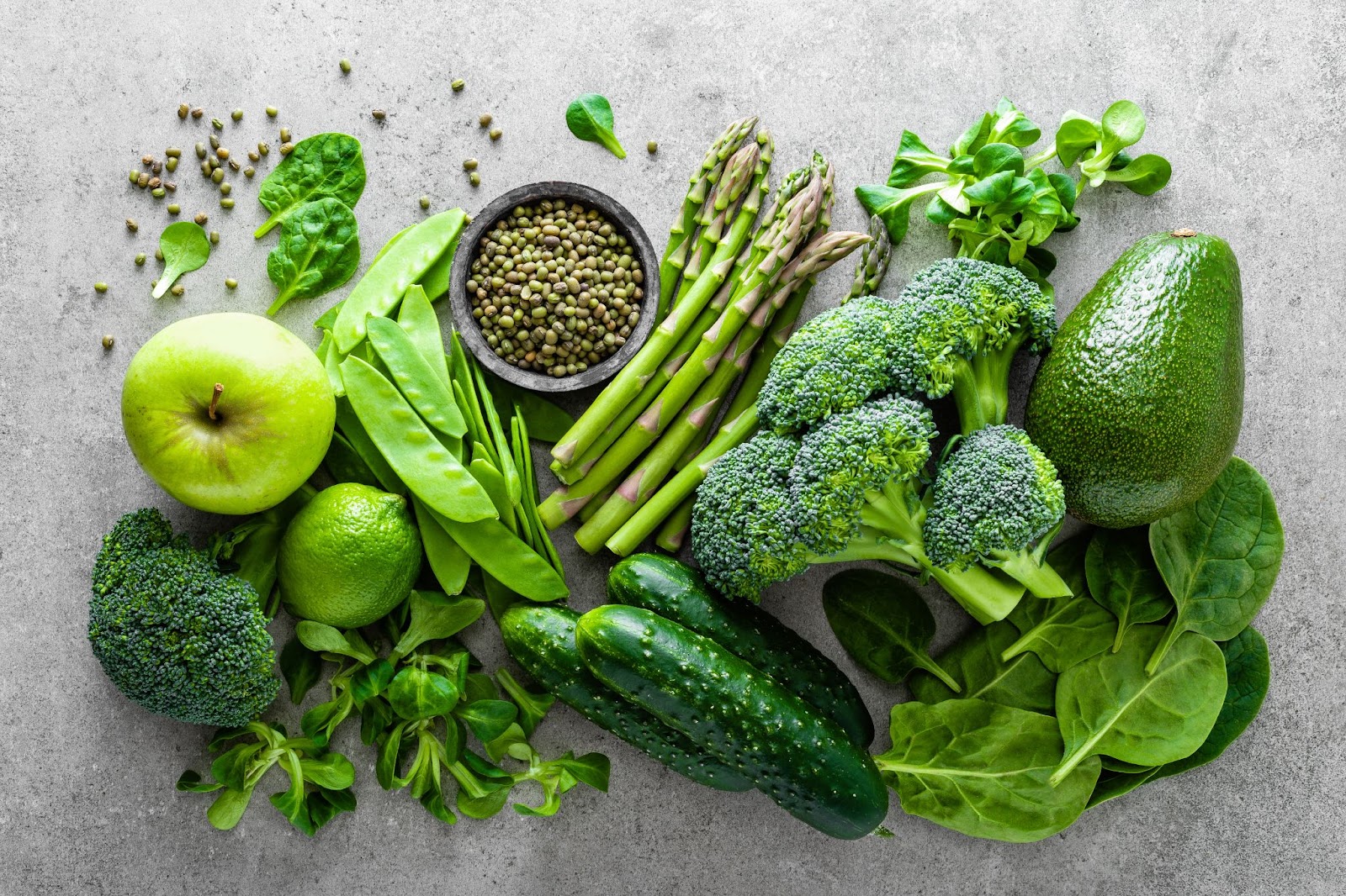 Flat lay shot of healthy vegetarian and fresh green food selection