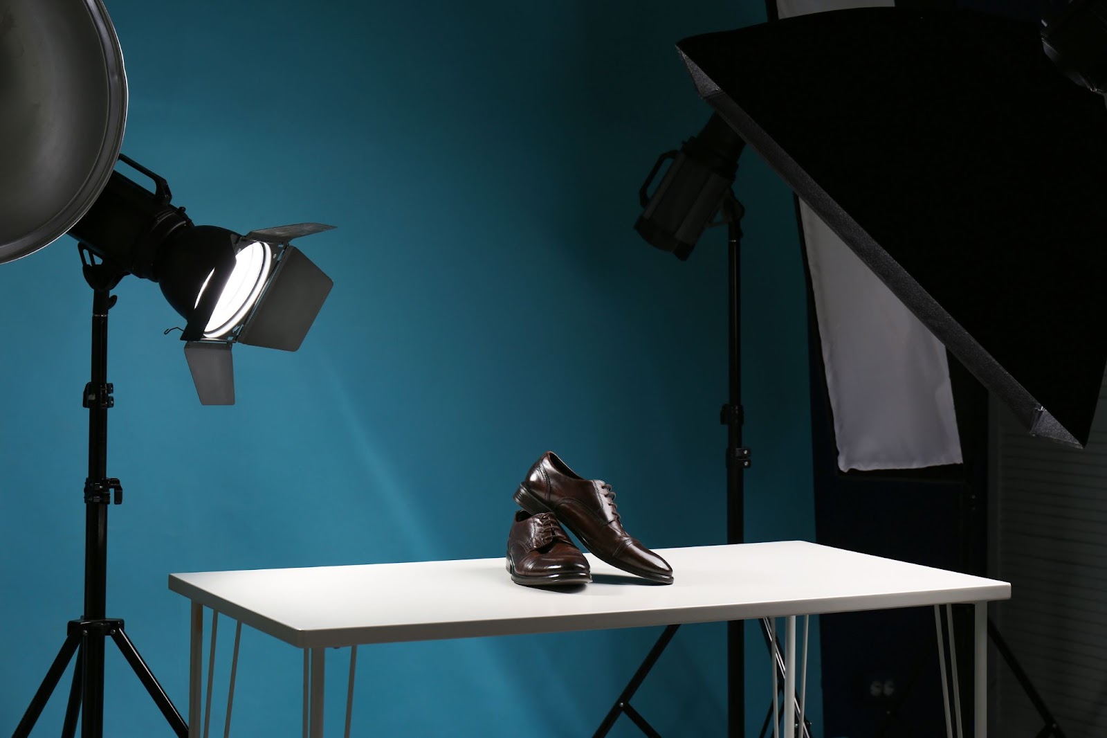 Shooting of men's shoes for product promotion in photo studio