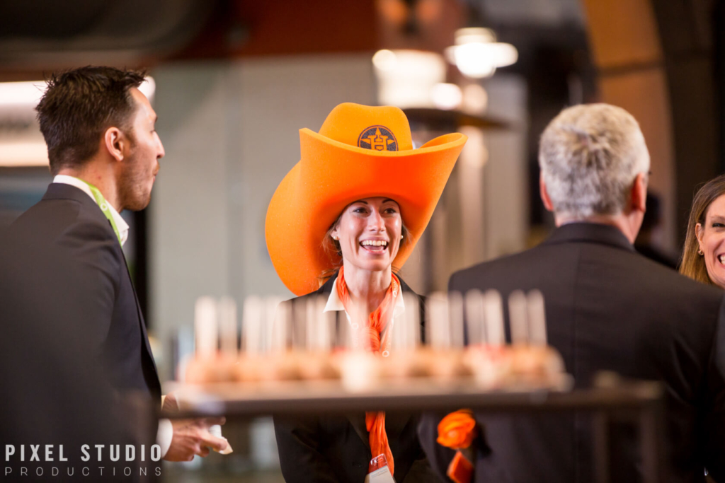 Event photography by Pixel Studio Productions capturing guests at a Houston corporate celebration