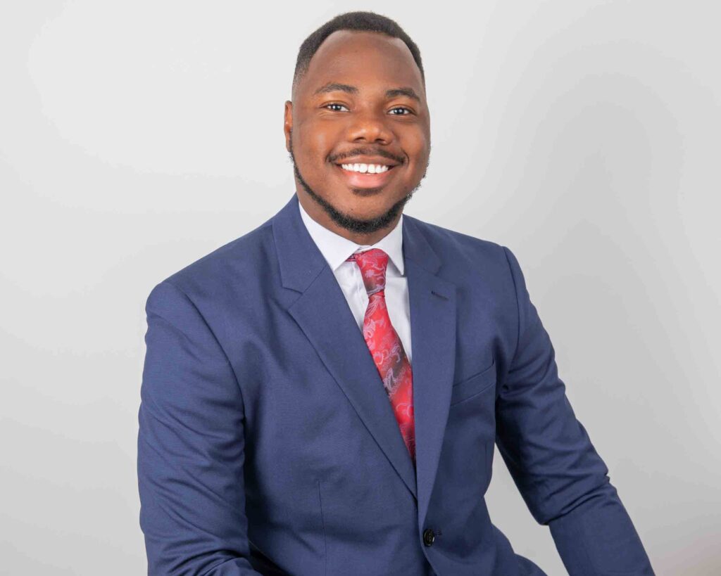 Professional studio headshot of a man in blue suit by Pixel Studio Productions in Houston