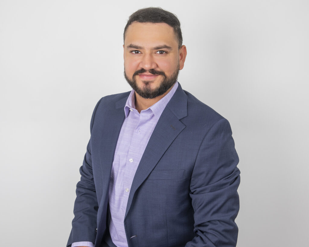 Professional studio headshot of a man in a suit photographed in Houston for 2026 business and branding use.