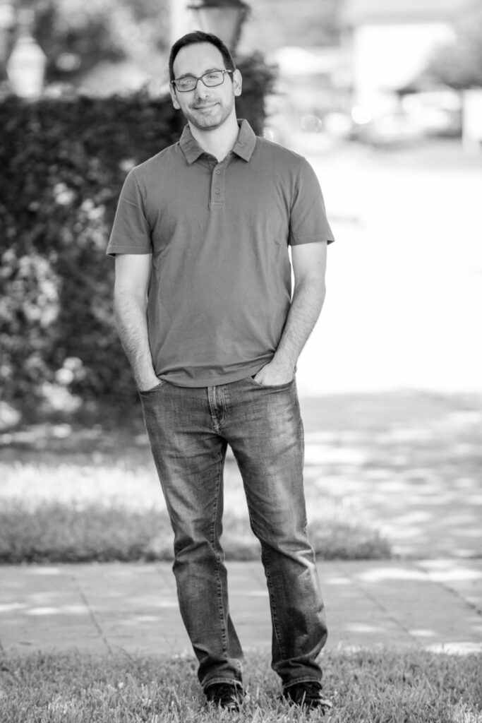 dating profile photographer in Houston capturing a full-body black and white outdoor portrait for dating apps