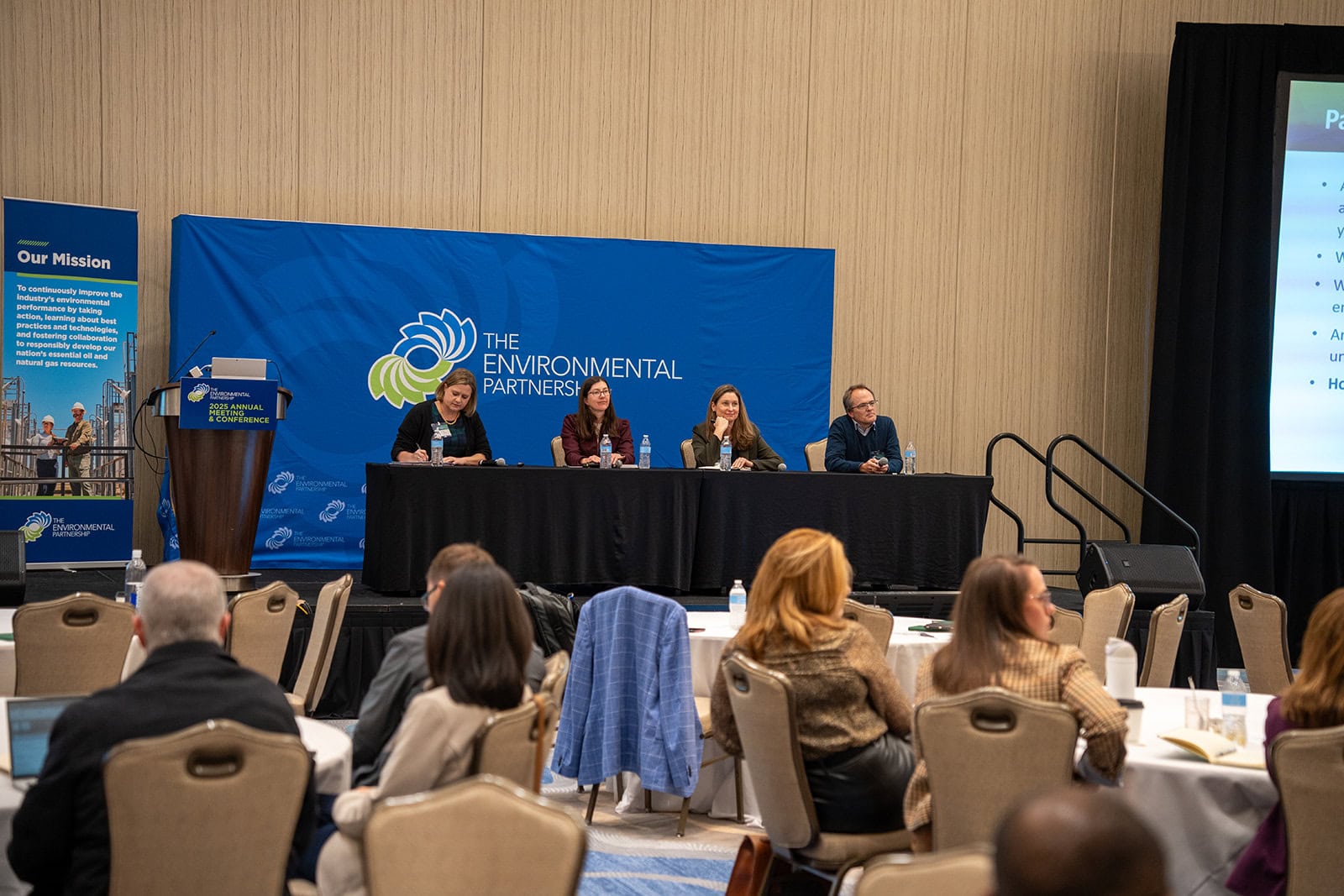 Panel discussion at environmental partnership conference in Houston.
