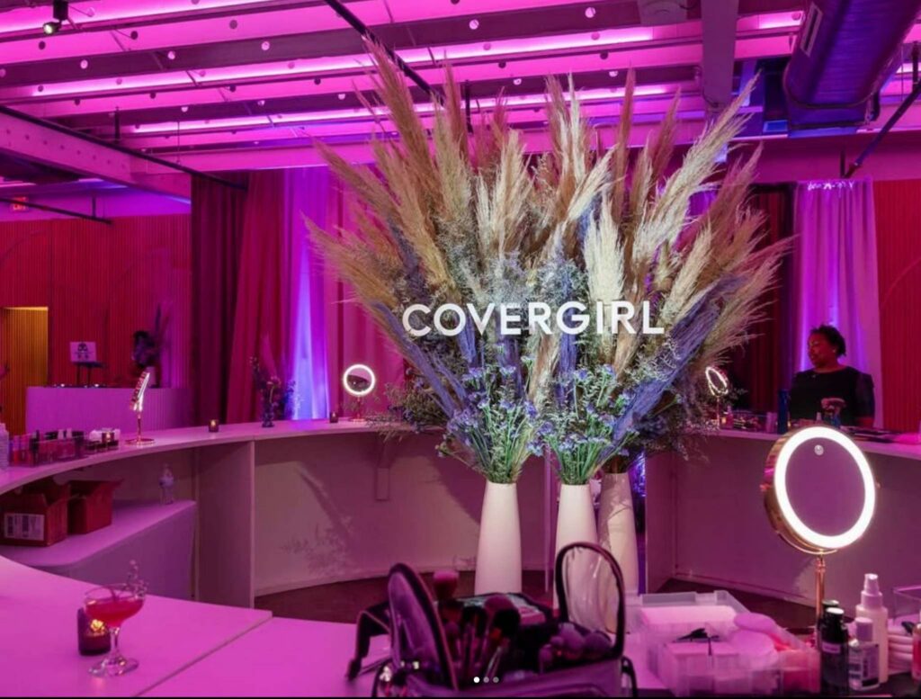 Event photographer booking Houston corporate event makeup station setup