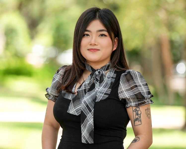 Anh Kieu employee at pixel studio productions outdoor headshot