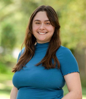 Lily employee at pixel studio productions outdoor headshot